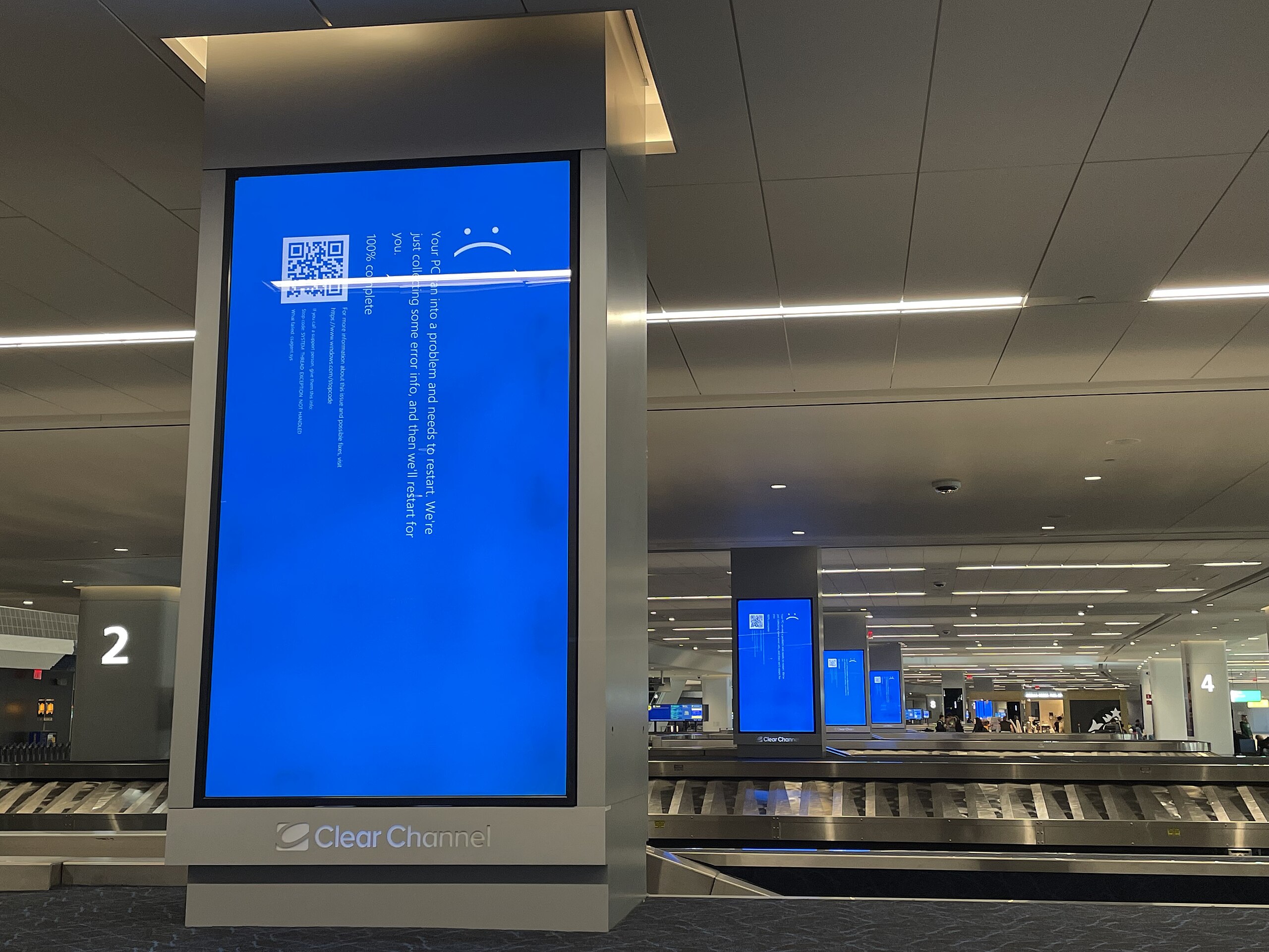 Blue screens of death at LGA airport due to the July 2024 CrowdStrike outage. (Source: Wikimedia Commons.)