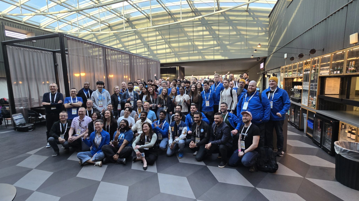 Group photo of CNCF ambassadors and Kubstronauts at KubeCon EU 2025